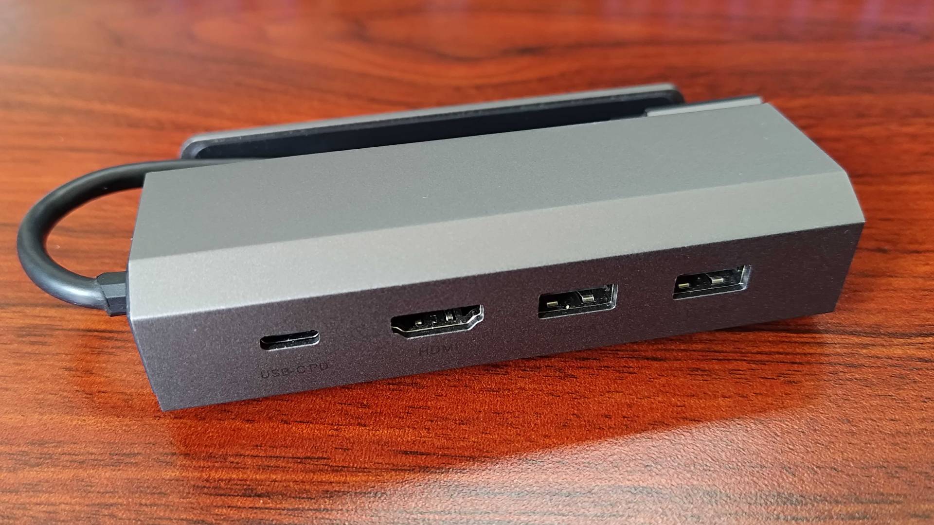 Back of Jsaux 5-in-1- Steam Deck dock with HDMI and USB ports in view.