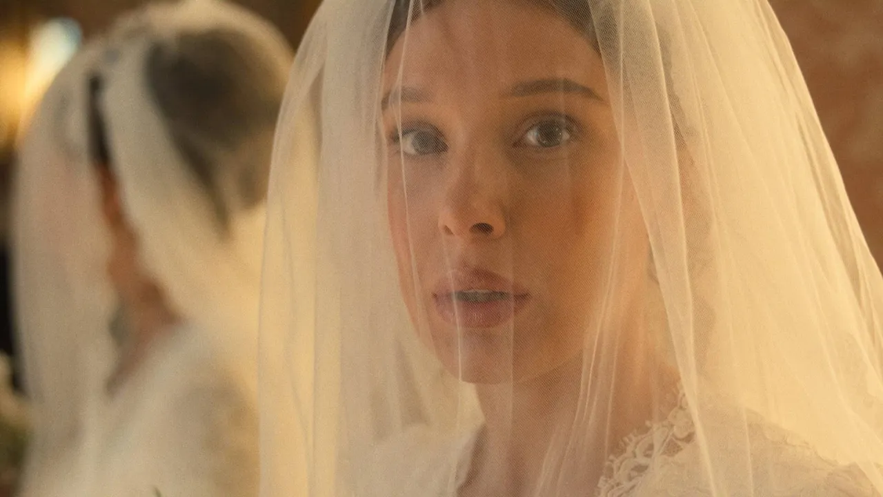 Millie Bobby Brown in Enola Holmes 3 with a wedding veil over her face