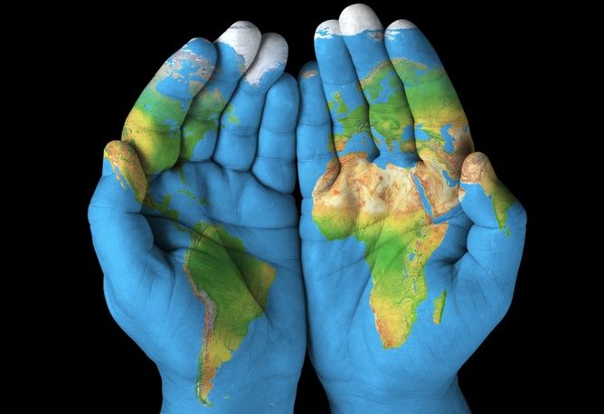 Earth map on hands, continent creatation