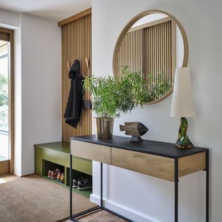 modern entrance hall with console table and mirror