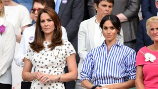 london, england july 14 catherine, duchess of cambridge and meghan, duchess of sussex attend day twelve of the wimbledon tennis championships at the all england lawn tennis and croquet club on july 14, 2018 in london, england photo by karwai tangwireimage