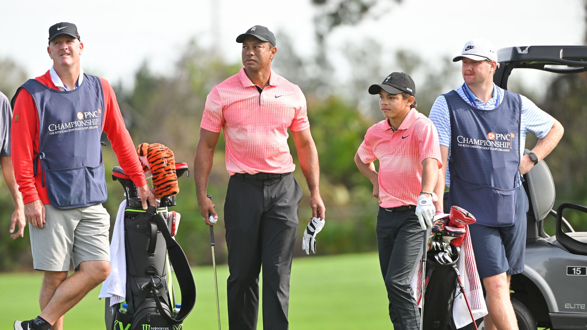 Joe LaCava, Tiger Woods, Charlie Woods and Joseph LaCava at the 2022 PNC Championship