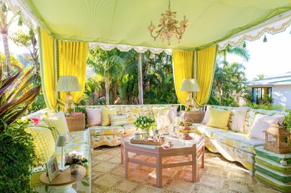 Kips Bay Decorator Show House - yellow luxury patio with floral upholstered sofa
