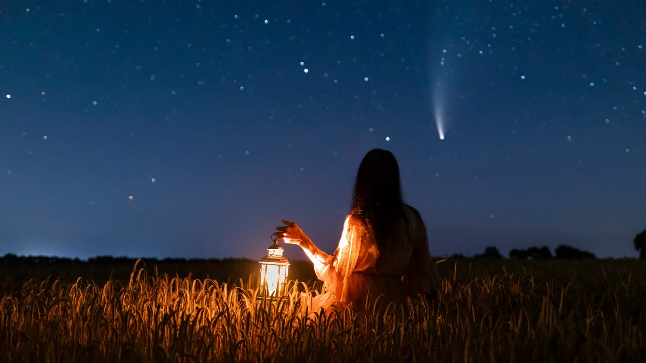 Woman looking at constellations