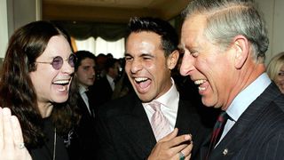 Prince Charles,Prince of Wales shares a joke with Ozzy Osbourne and Chico at a reception at Clarence House