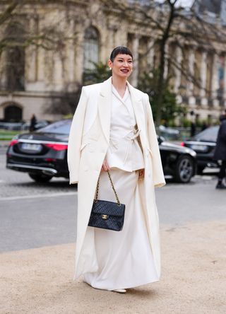 French street style - woman wearing an all-white outfit