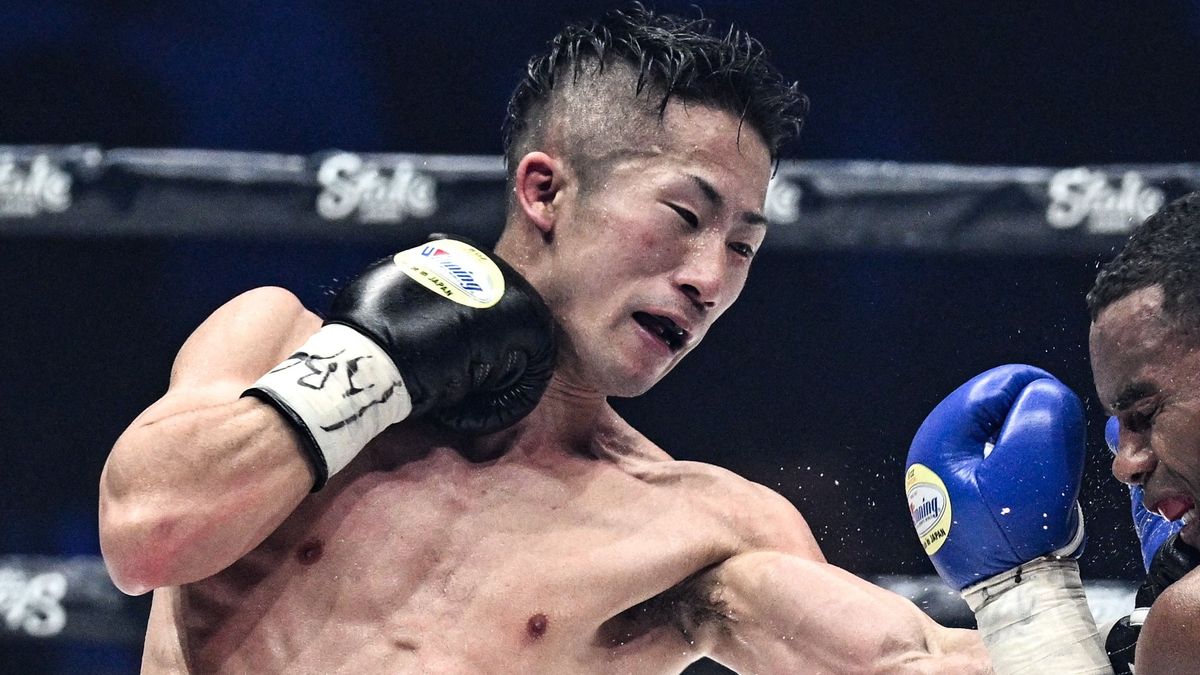 Japan&#039;s Takuma Inoue throws a punch in the ring ahead of the 