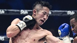 Japan's Takuma Inoue throws a punch in the ring ahead of the 