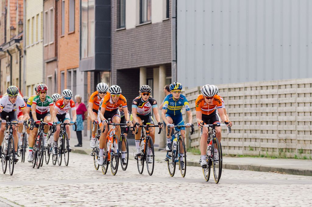 Anna van der Breggen (Netherlands) leads across the cobbles.