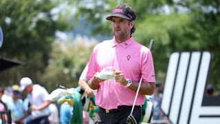 Bubba Watson wearing a pink polo during a LIV Golf event