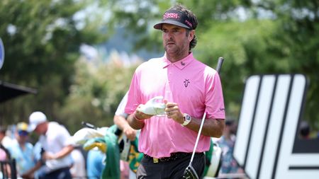 Bubba Watson wearing a pink polo during a LIV Golf event