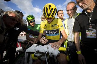 Chris Froome signs autographs at the Natourcriterium Aalst