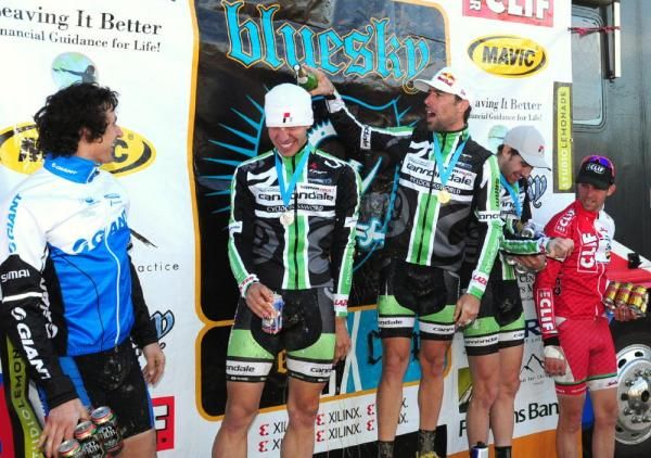 Tim Johnson (Cannondale-Cyclocrossworld.com) dumps some champagne on Driscoll's head