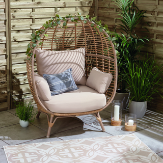 wooden egg chair with cushions