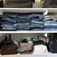 Stack of jeans in a closet