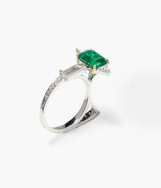 ‘Cat’ ring with white diamonds and emerald