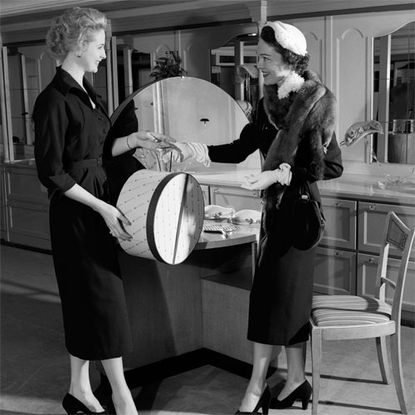 Style, Hat, Monochrome photography, Monochrome, Black-and-white, Chair, Suit trousers, Kitchen & dining room table, Vintage clothing, Sun hat, 