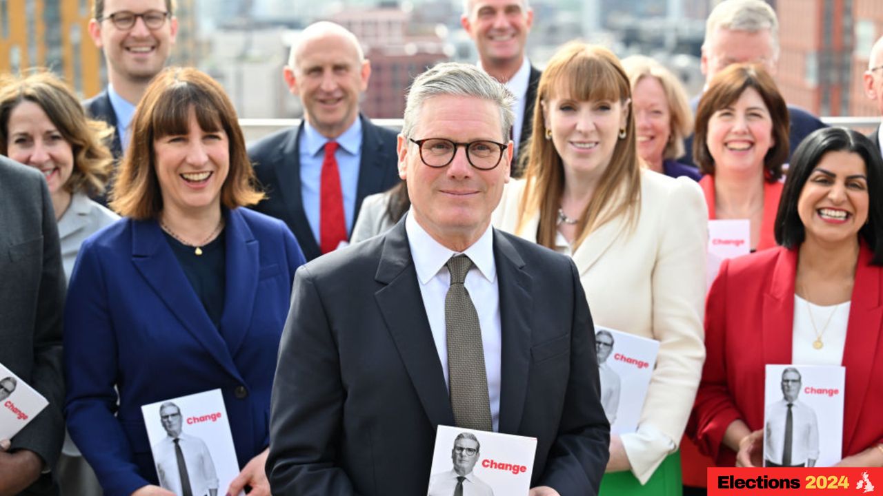 Sir Keir Starmer standing with the Labour party to launch their election manifesto