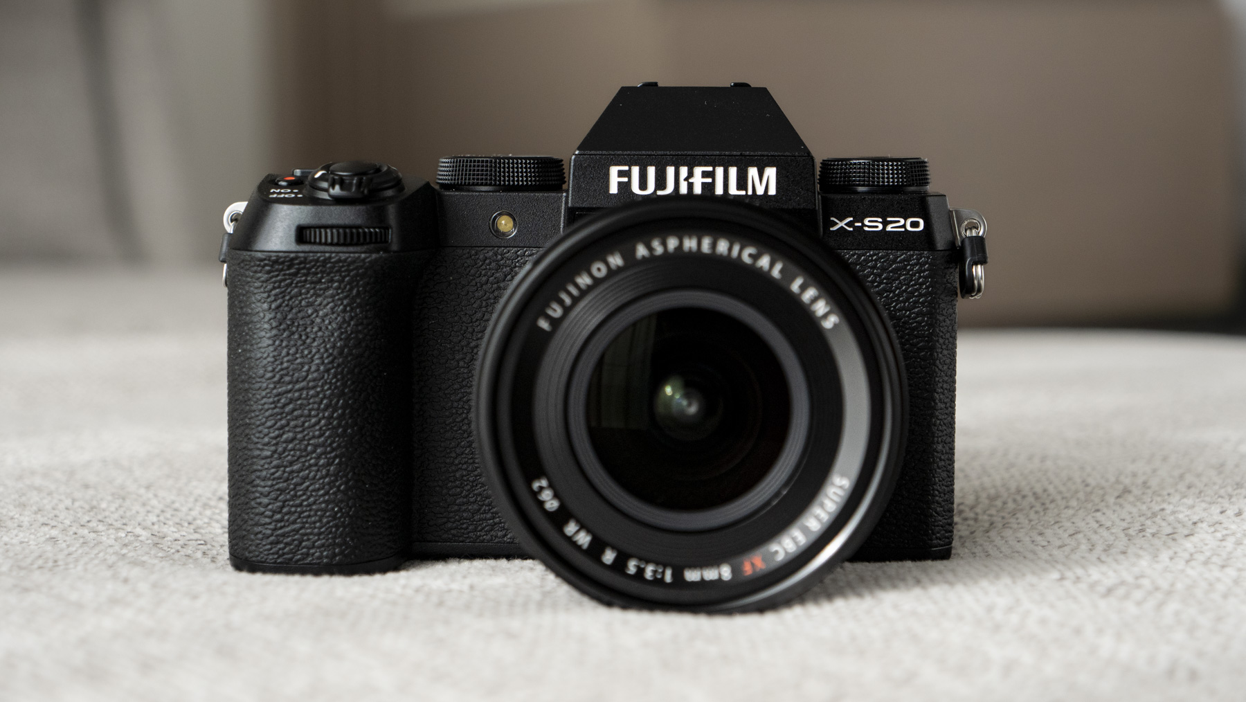 Fujifilm X-S20 camera front with 8mm F3.5 lens attached