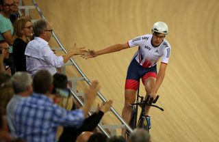 Andrew Tennant of Great Britain celebrates after taking bronze in the Men's Individual Pursuit