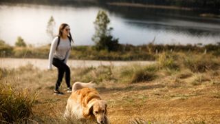 Woman walking with dog