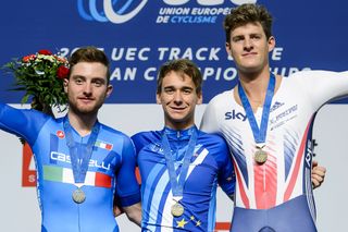 (L -R) Silver medalist Italy's Simone Consonni, gold medalist France's Bryan Coquard and bronze medalist Britain's Christopher Latham pose during the medal ceremony of the Men's Elimination Race at the Track Elite European Championships