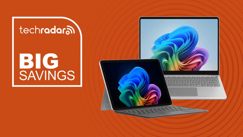 Two Microsoft Surface Laptops on an orange background