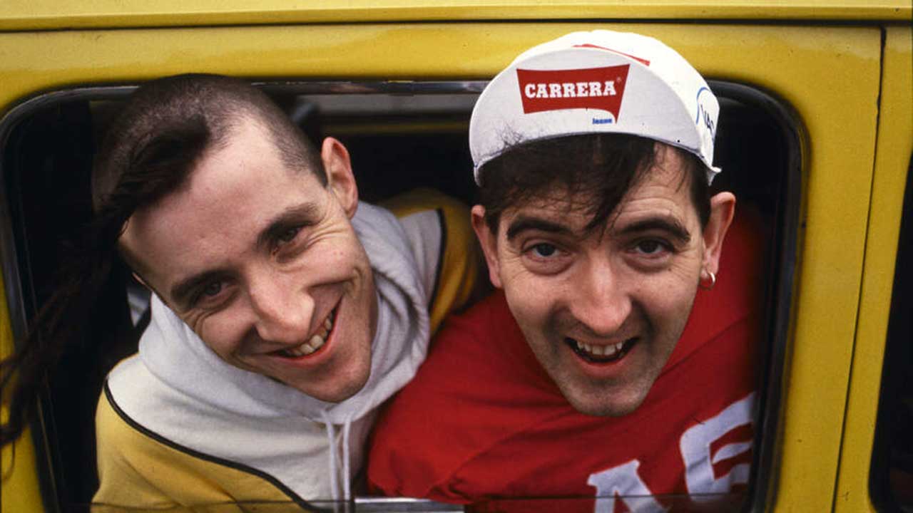 Carter USM leaning out of a car window