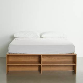 Bed with wooden drawers 