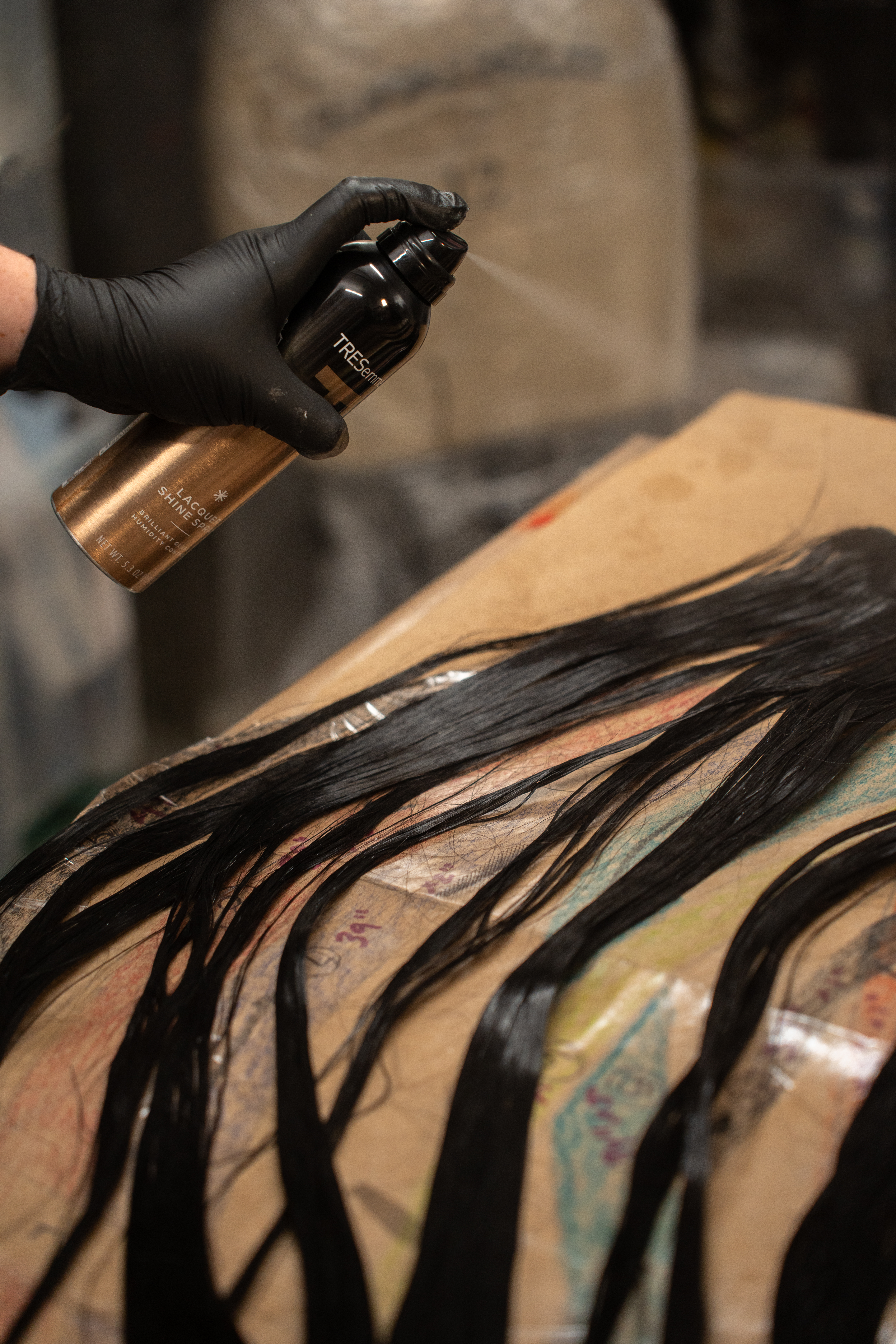 close-ups of Lisa Rinna's Christian Cowan hair dress before the 2026 Oscars