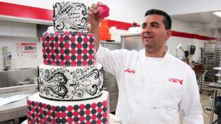 Buddy Valastro and one of his cake creations in Cake Boss.