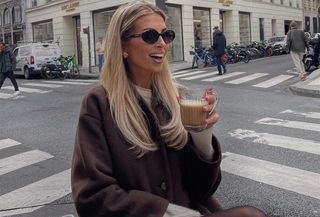 Woman in Paris wearing a fall outfit.