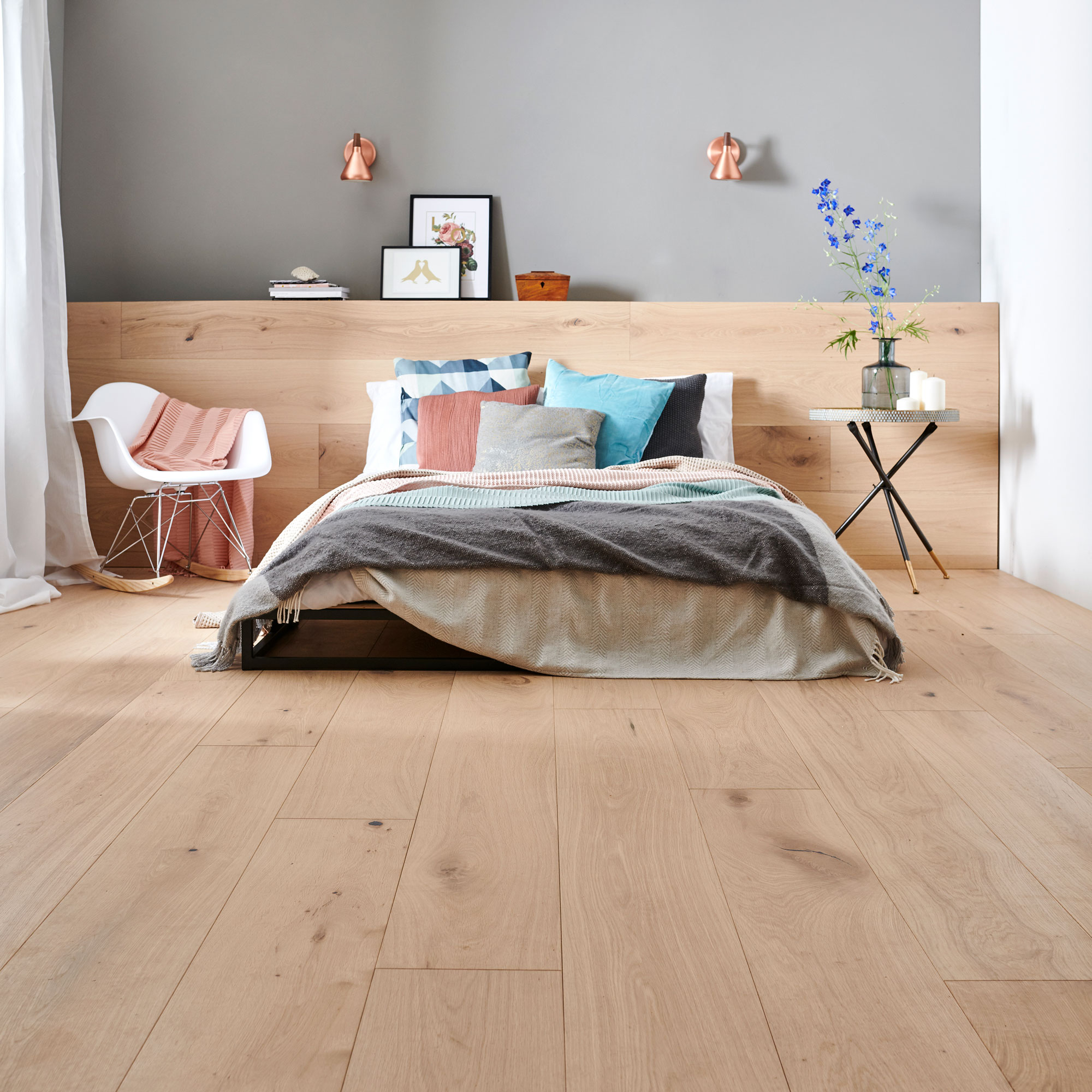 wide plank wooden flooring in bedroom