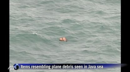 Debris, bodies from AirAsia flight found in Java Sea