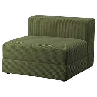 A dark green corduroy chair 