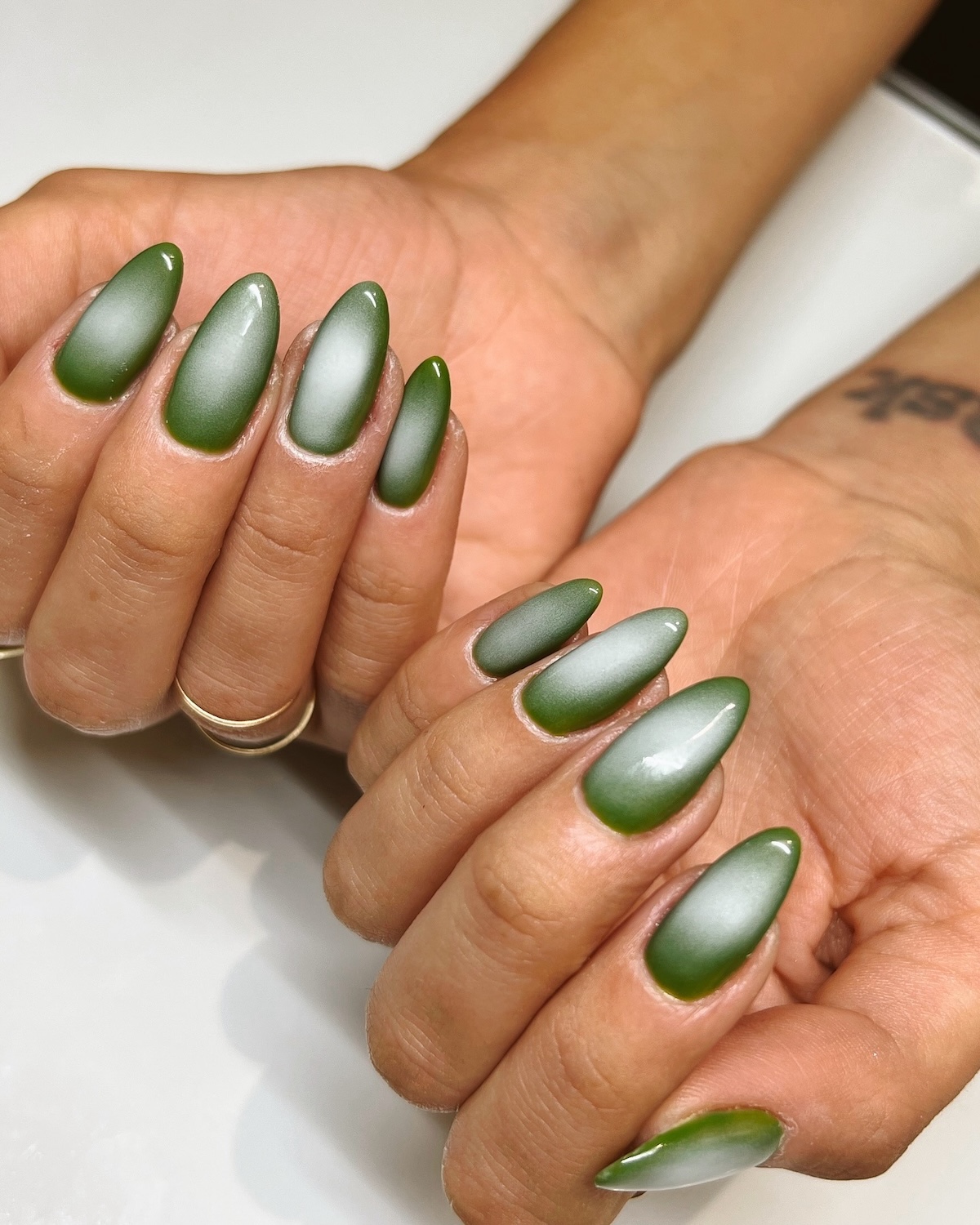 Green cat-eye nails