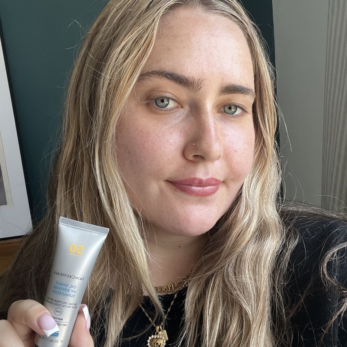 Amelia wearing SkinCeuticals Oil Shield UV Defense Sun Cream SPF 50