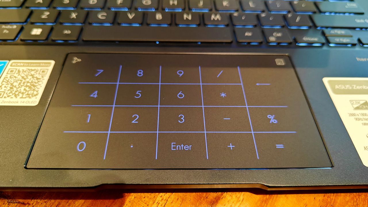 Close up of Asus Zenbook 14 OLED UM3402Y touchpad.