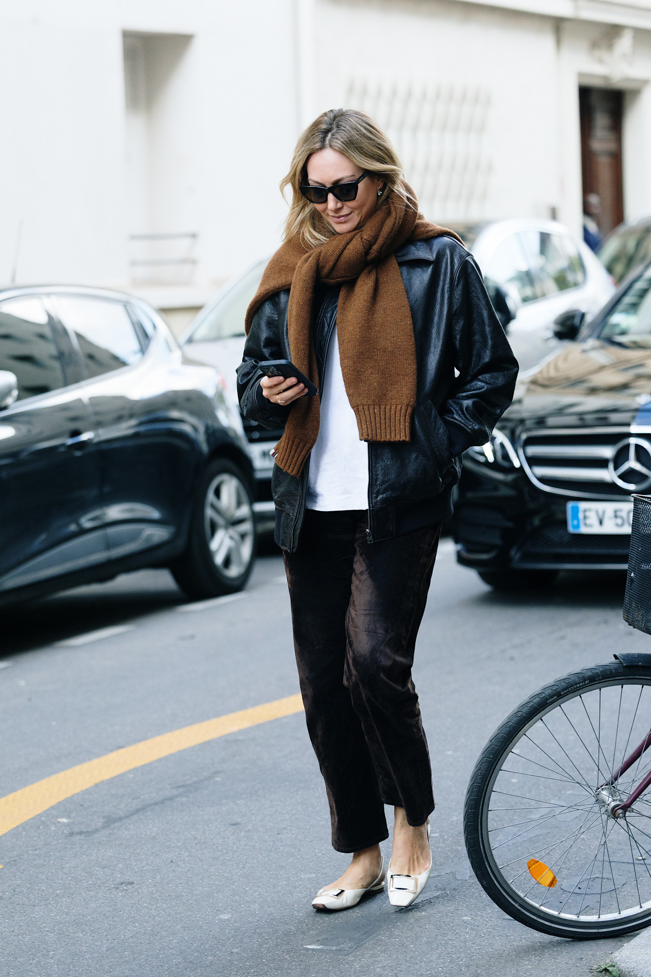 Paris Fashion Week Street Style: Jumpers as accessories.
