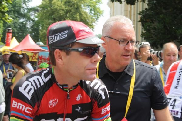 Cadel Evans always turns up with his press officer in close proximity