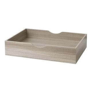 A large, light natural wooden underbed storage drawer