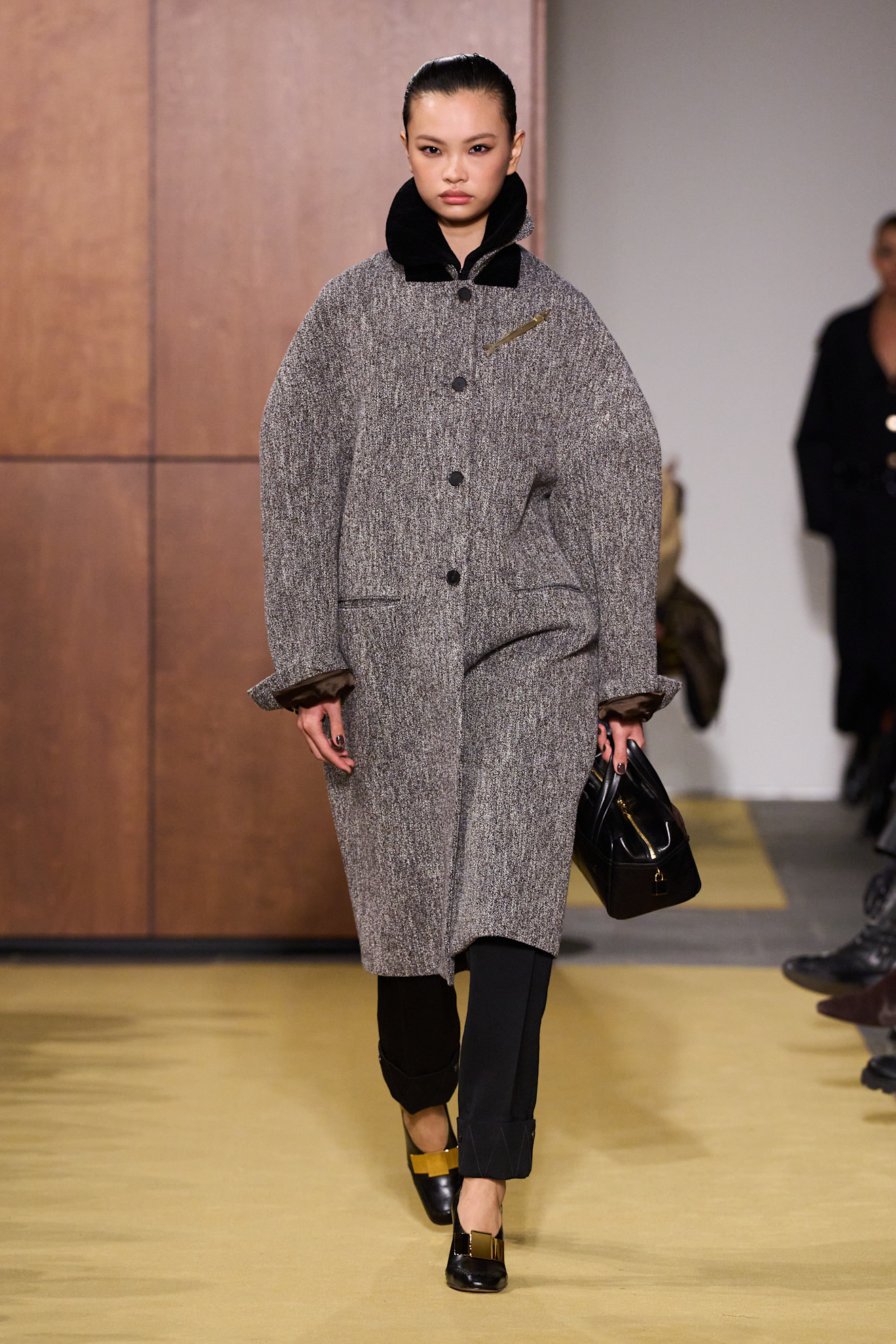 a model walks the Tory Burch fall/winter 2026 runway