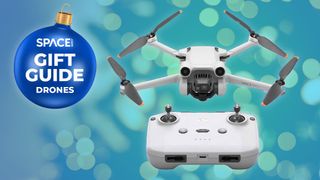 Drones on a blue background with christmas holiday gift guide badge