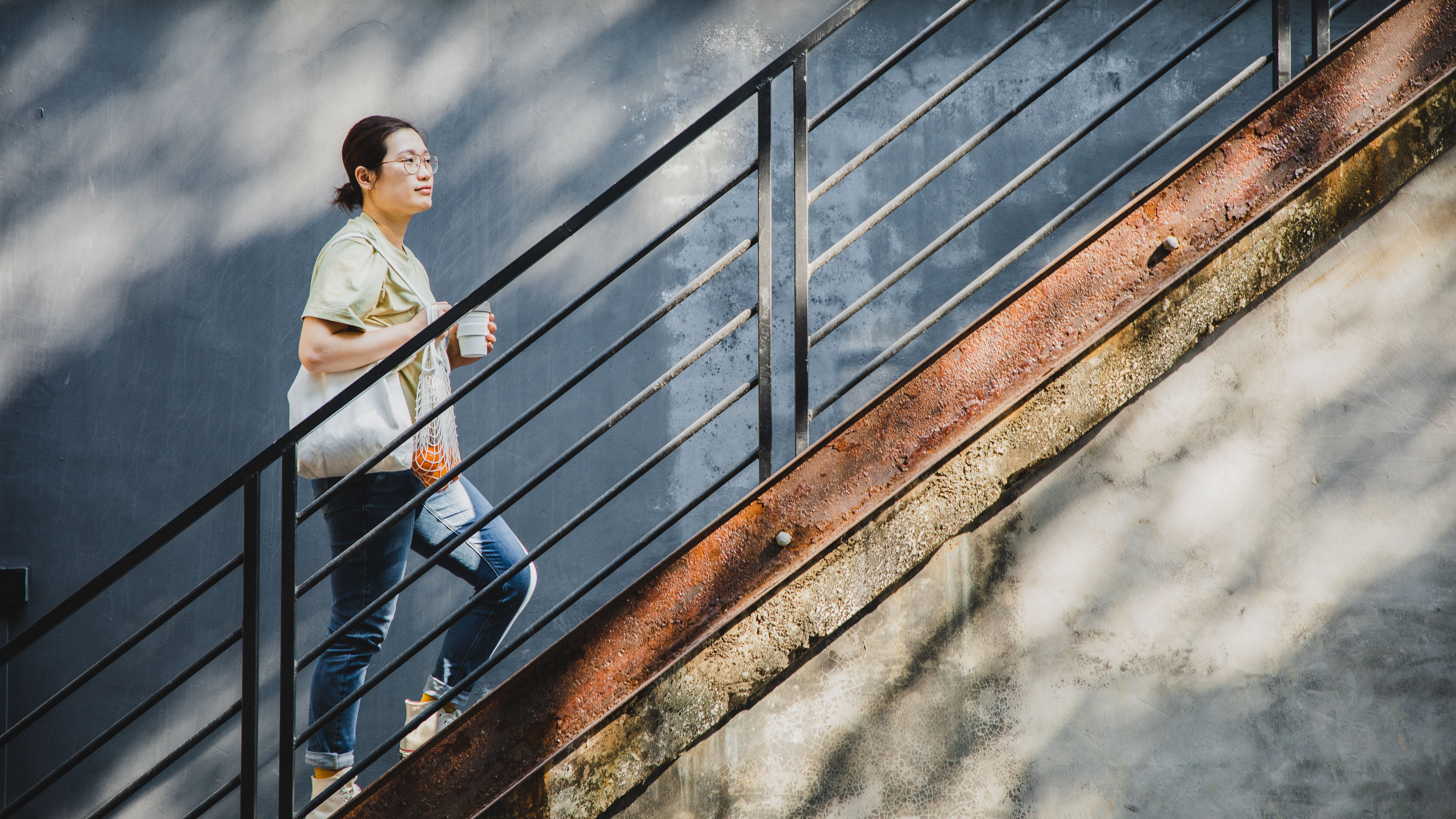 Woman walking up stairs