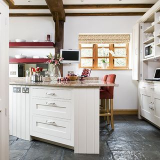 kitchen room with kitchen shelves and kitchen worktop