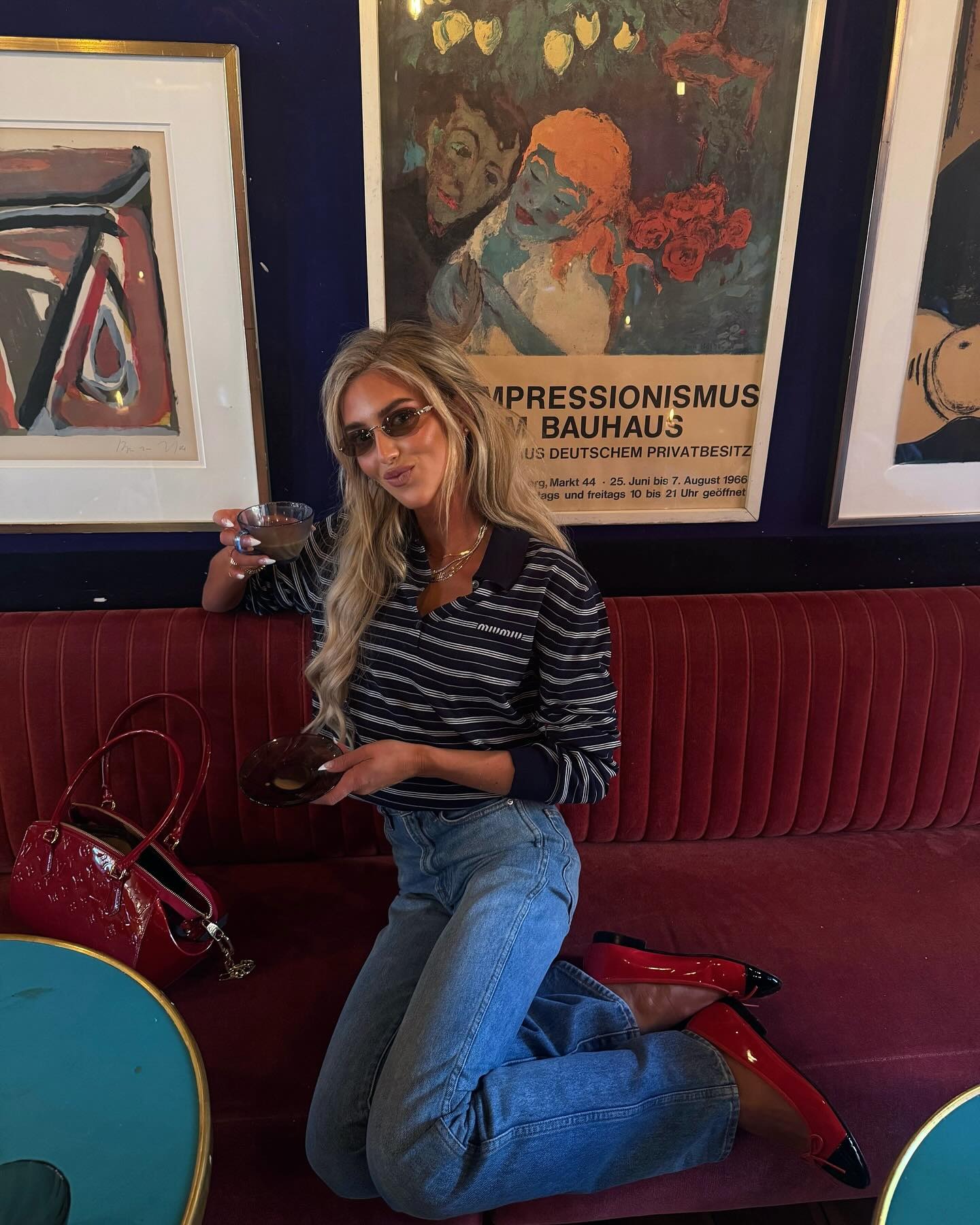 Emili Sindlev in striped polo and jeans