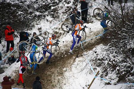 The leading riders take to the run-up section on the first lap.