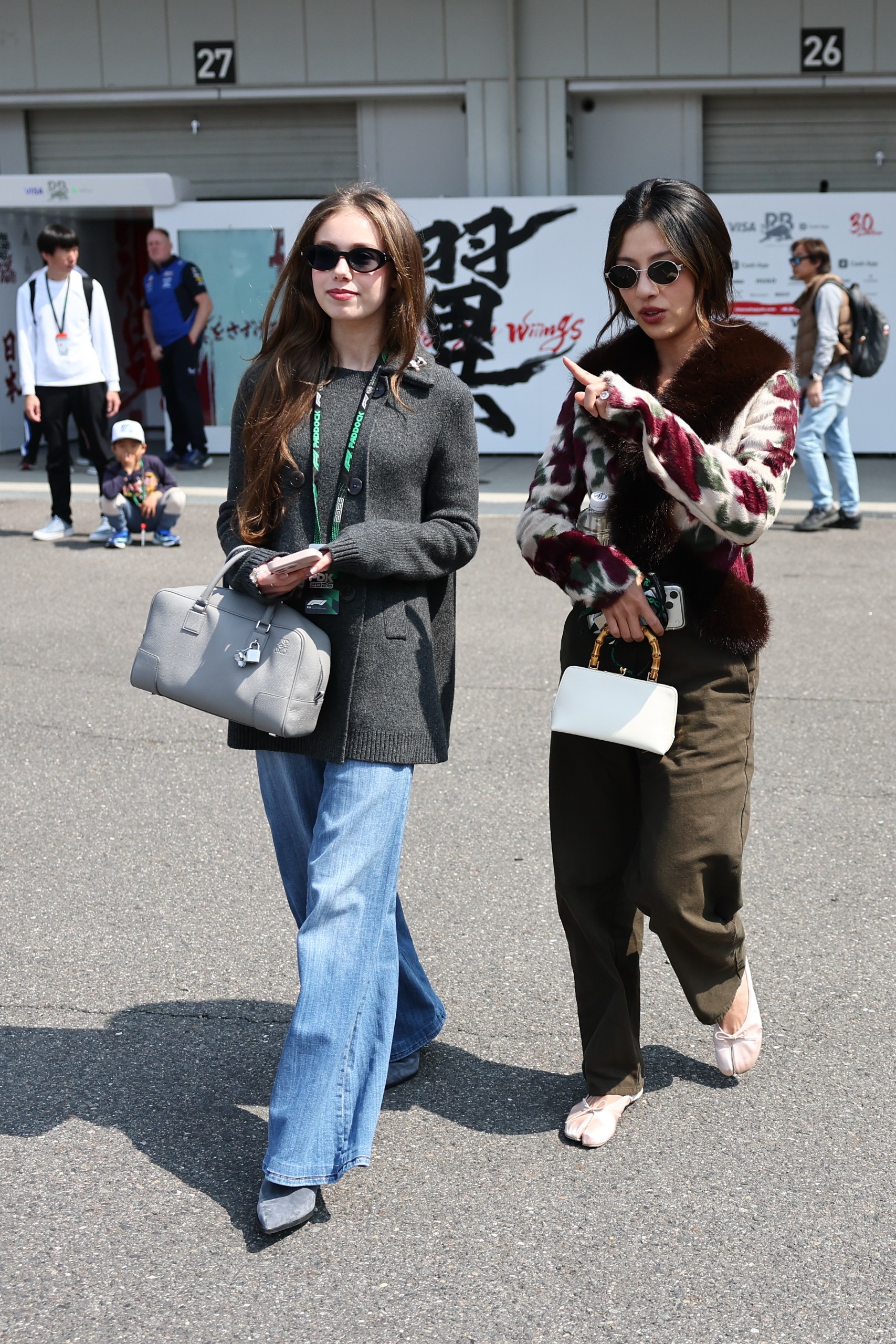 Lily Zneimer and Lily Muni He before the qualifying ahead of the Formula 1 Japanese Grand Prix at Suzuka Circuit in Suzuka, Japan on March 28, 2026.