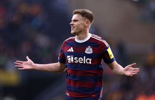 WOLVERHAMPTON, ENGLAND - SEPTEMBER 15: Fabian Schaer of Newcastle United celebrates scoring his team's first goal during the Premier League match between Wolverhampton Wanderers FC and Newcastle United FC at Molineux on September 15, 2024 in Wolverhampton, England. (Photo by Naomi Baker/Getty Images)