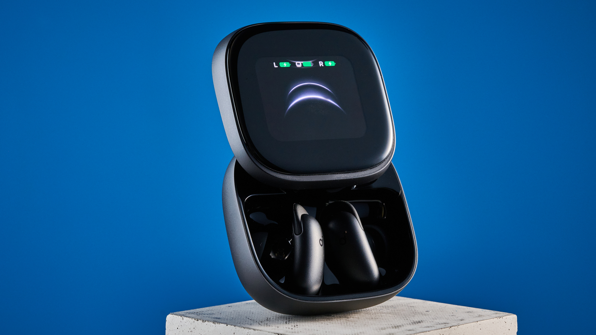 the soundcore liberty 5 pro max earbuds photographed against a blue tom's guide background